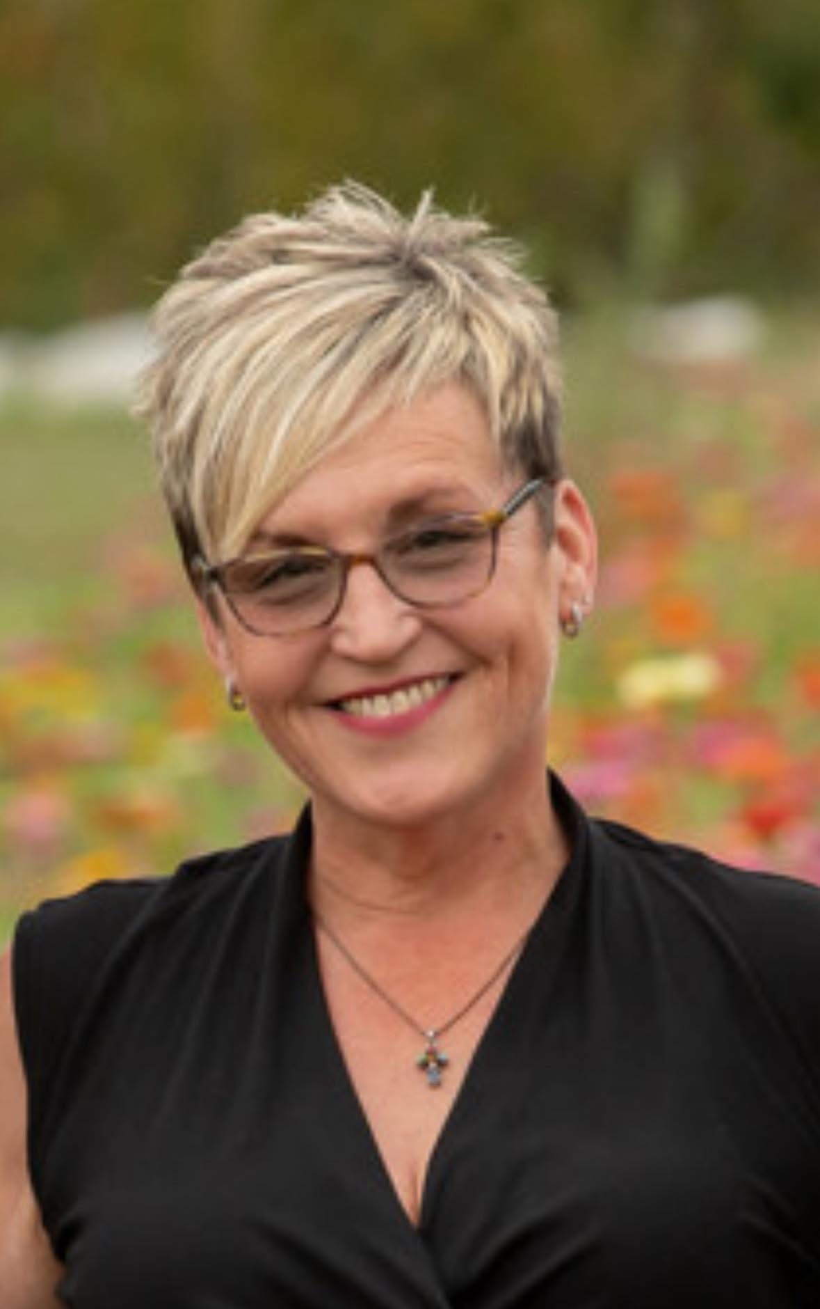 Head Shot_1776272046.jpg